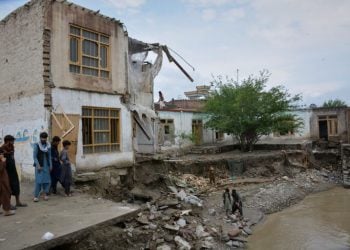 Damaged house by river after roof collapse in Afghanistan (Photo Credit: AP)