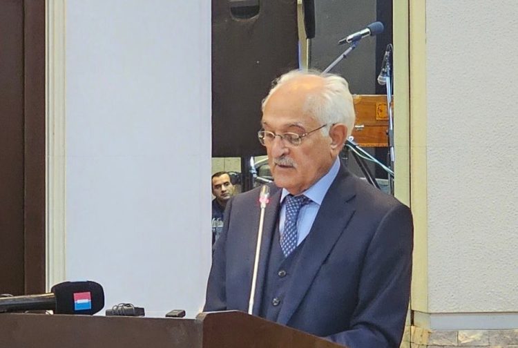 Rangin Dadfar Spanta speaking on stage during an event (Photo Credit: NKiannia_Heravi)