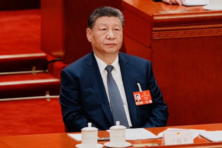 Xi Jinping at energy meeting (Photo Credit: VINCENT THIAN / POOL / AFP)