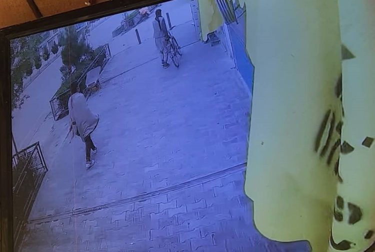 People walk past shops in Kabul as local shopkeepers raise concerns over rising armed robberies in the city.(Photo credit: Exclusive)