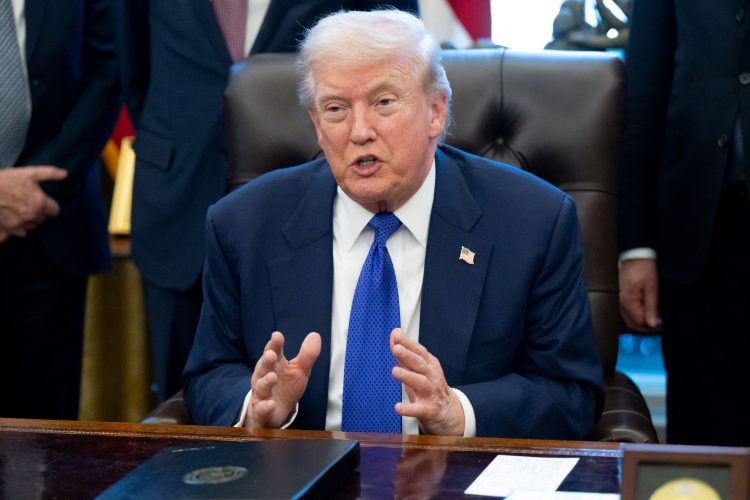 US President Donald Trump speaks to the press about a critical minerals stockpile with $12 billion in initial funding, as Washington seeks to lower reliance on China for rare earths and other resources, in the Oval Office of the White House in Washington, DC, on February 2, 2026. (Photo by SAUL LOEB / AFP)