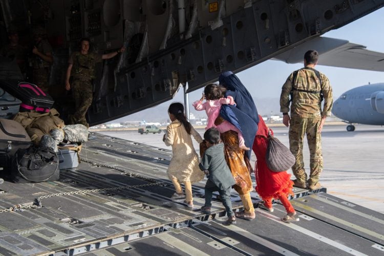 Afghan Refugees. (Photo credit: Master Sgt. Donald R. Allen/U.S. Air Forces Europe-Africa via Getty Images)