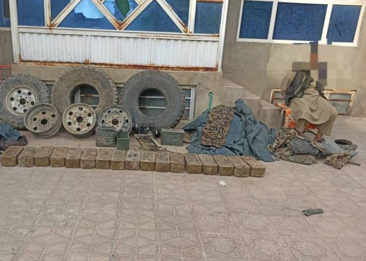A detained man with seized weapons and equipment in Faryab. (Photo credit: Social Media)