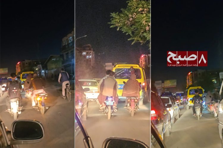 Motorcycles, cars, and a public transport vehicle navigate heavy nighttime traffic congestion on a Kabul street, reflecting the city's growing urban transport crisis. (Photo credit: 8am.media)