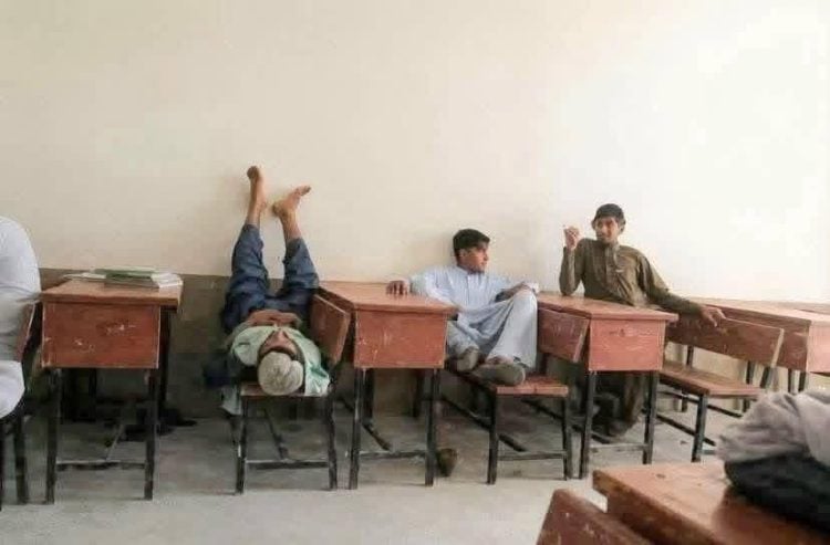 Students sit idle in a classroom in Khost province as schools across the region face a severe shortage of qualified science and language teachers. (Photo Credit: Exclusive)