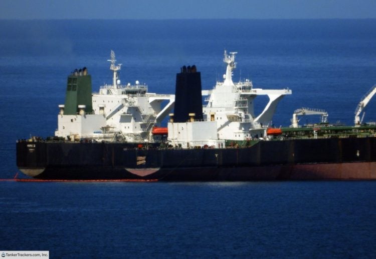 Two large oil tankers sail on blue waters as Kuwait halts all crude oil exports for the first time since 1991. (Photo credit: TankerTrackers.com)