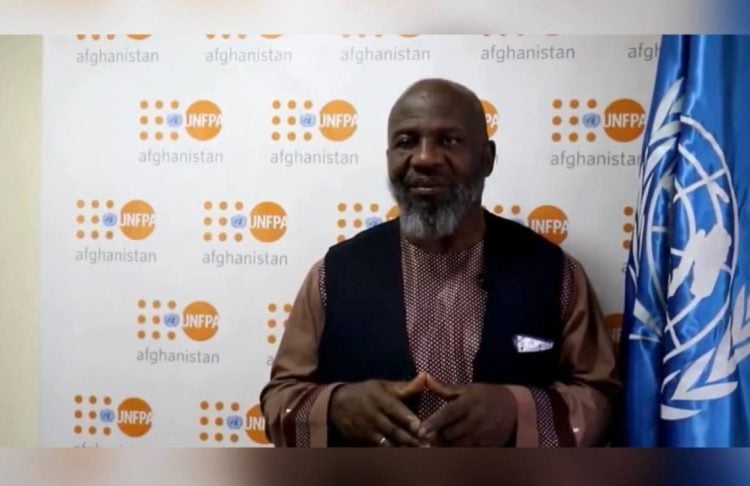 The UNFPA representative sits while explaining the employment situation of midwives and healthcare challenges in Afghanistan. (Photo credit: UNFPA)