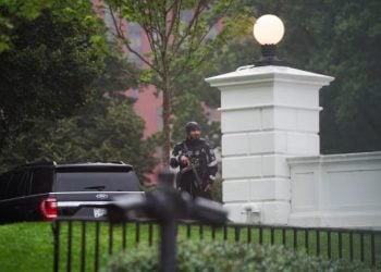 Officer patrolling around the white house following the shooting incident (Photo credit: CNN)