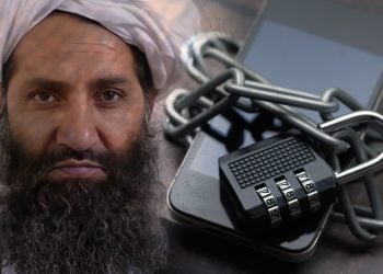 Taliban Supreme Leader Hibatullah Akhundzada beside a chained and padlocked smartphone, illustrating the group's ban on smartphone use across government offices. (Photo credit: Pexels)