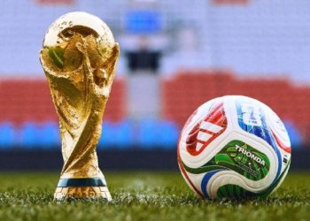The FIFA World Cup trophy and an official match ball are displayed during the 2026 tournament (Photo: barlamantoday)