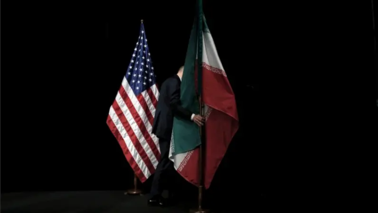 Flags of the United States and Iran displayed side by side. (Photo: Reuters)
