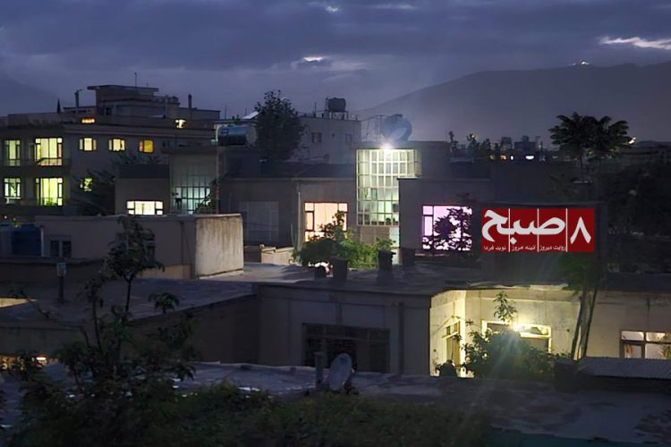 Lights glow in homes across a Kabul neighborhood at dusk as residents complain of rising electricity bills. (Photo credit: 8am.media)