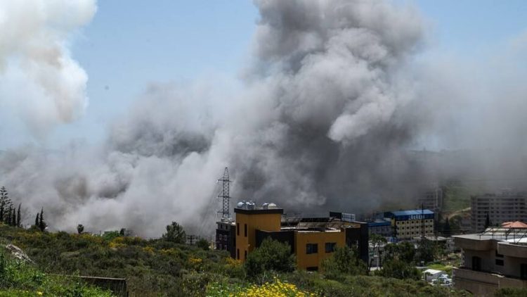 Smoke rises over a residential area in Lebanon following an Israeli airstrike. (Photo credit: AA)