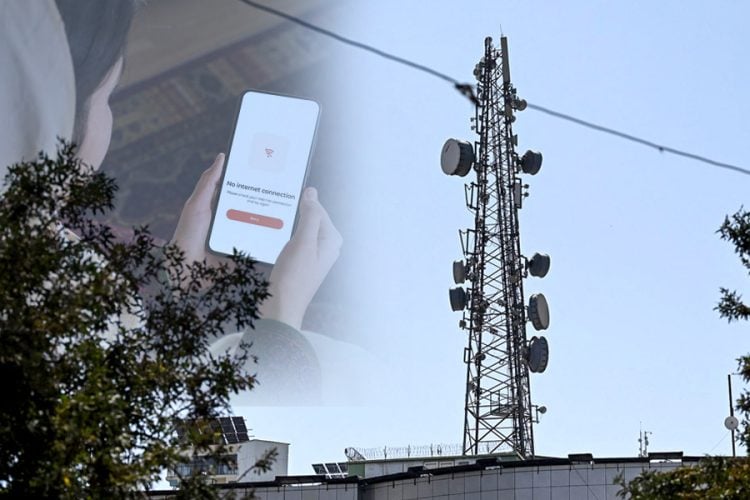 A user checks a "No internet connection" notice on a smartphone near a telecommunications tower in Afghanistan amid sharply rising internet prices. (Photo credit: Pexels)