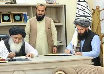 The Minister of Public Works of the Taliban is signing a contract with a private company to reconstruct a 15-kilometre section of the Salang Highway. (Photo: mopw.gov)