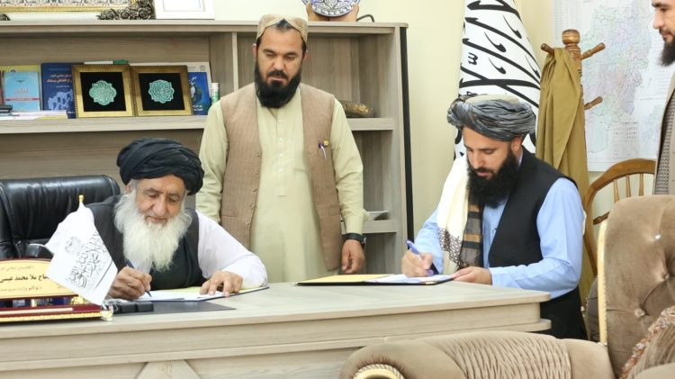 The Minister of Public Works of the Taliban is signing a contract with a private company to reconstruct a 15-kilometre section of the Salang Highway. (Photo: mopw.gov)
