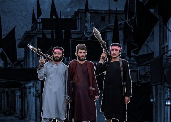 Armed Taliban fighters stand in a street lined with black Muharram flags in Afghanistan, as restrictions on Shia mourning ceremonies tighten ahead of Ashura 2026. (Photo Credit: Exclusive / AFP)