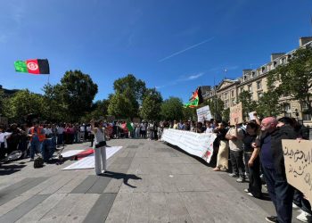 Citizens of Afghanistan gather in Paris to protest the Taliban's detention of women and girls in Herat, holding banners and the national flag in a show of solidarity. (Photo Credit: Exclusive)