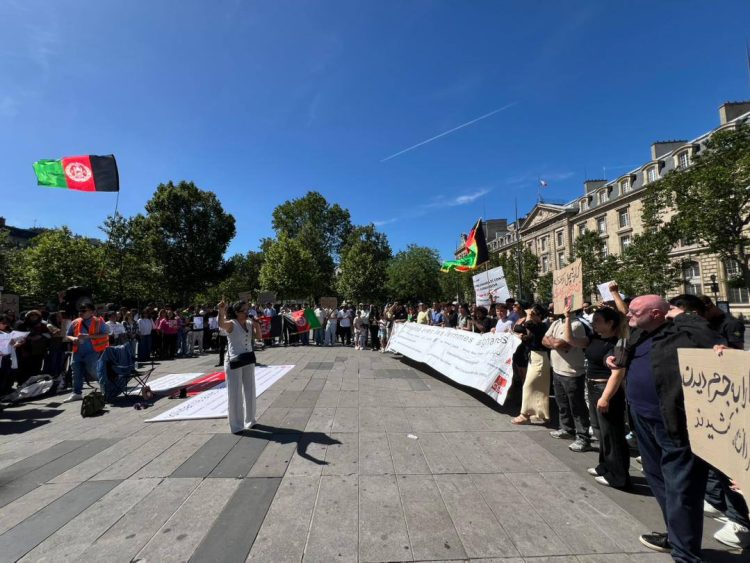 Citizens of Afghanistan gather in Paris to protest the Taliban's detention of women and girls in Herat, holding banners and the national flag in a show of solidarity. (Photo Credit: Exclusive)