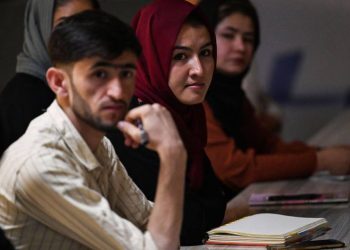 Students attend a classroom session as young people in Afghanistan seek greater access to education and opportunities. (Photo credit: AFP)