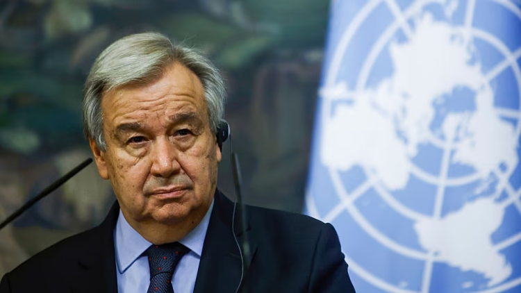 United Nations Secretary-General António Guterres speaks during a press briefing with a United Nations flag displayed in the background. (Photo credit: AP)