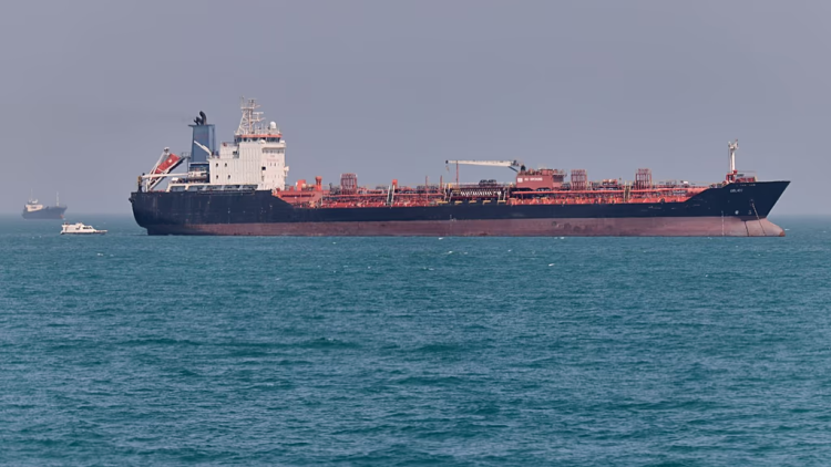 An oil tanker transits the Strait of Hormuz, one of the world's most important routes for global oil shipments. (Photo Credit: AP)