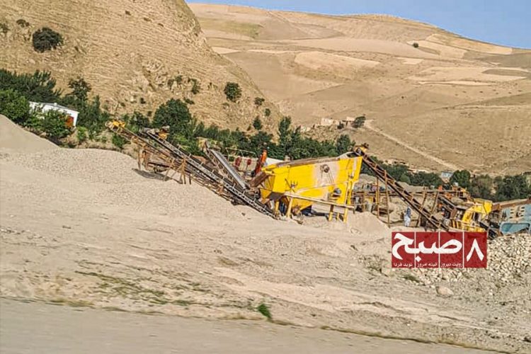 Heavy machinery processes gravel at a gold mining site in Badakhshan province, where farmland is increasingly sold or seized for mineral extraction. (Photo credit: 8am.media)