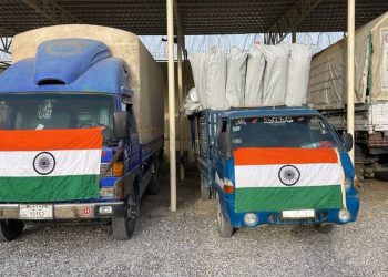 Trucks carrying humanitarian aid supplies arrive to support flood victims affected by devastating floods in Nuristan Province. (Photo credit: Randhir Jaiswal)