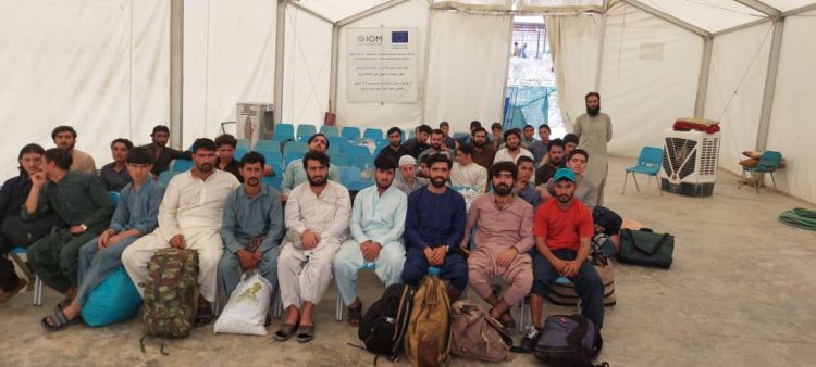 Citizens of Afghanistan who were released from Pakistani prisons gather at a reception center after returning to the country through the Torkham and Spin Boldak border crossings. (Photo credit: @MoRRAfg)