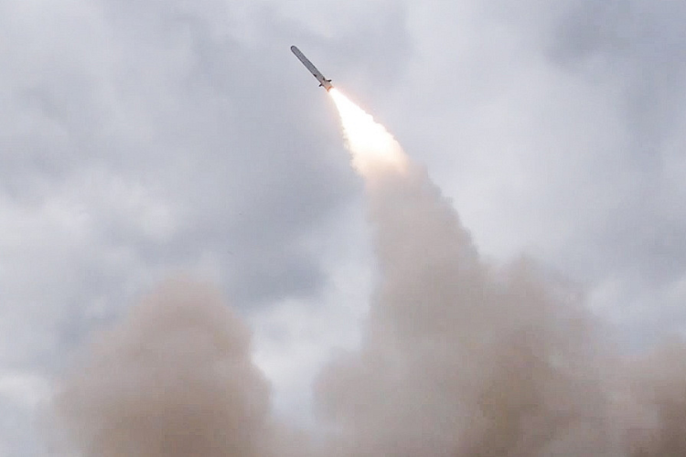A missile flies across the sky during Russian strikes on Ukraine; Moscow says military facilities were targeted. (Photo Credit: TASS)