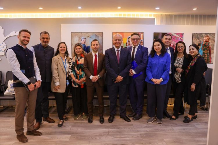 Representatives of UNHCR, diplomatic missions, media, and non-governmental organizations pose for a group photo during a meeting in Kabul focused on supporting returning citizens of Afghanistan. (Photo credit: @UNHCRAfg)
