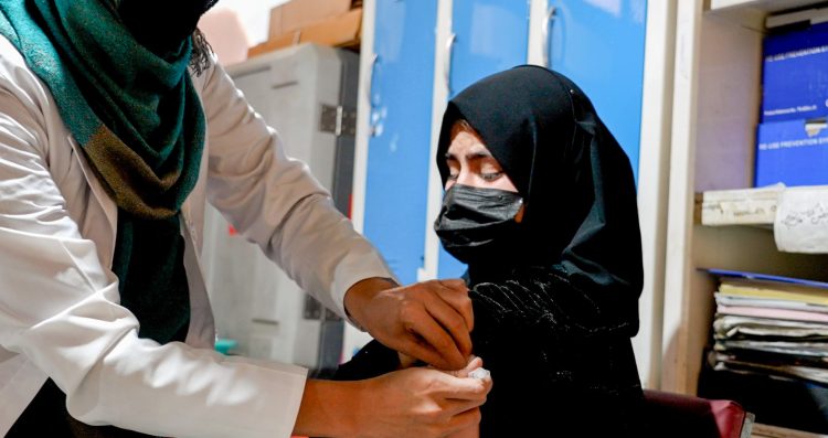 In the image, a teenage girl is seen as a health worker administering a vaccine to her. (Photo Credit: UNICEF/X)