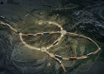 An aerial illustration maps the proposed trade corridor linking Iran, Afghanistan, and Tajikistan, with trucks shown moving along the route. (Photo credit: AI)