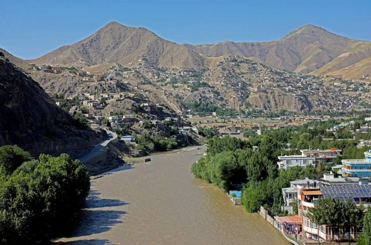 A river flows through a city in Badakhshan province. (Photo credit: UNDP)