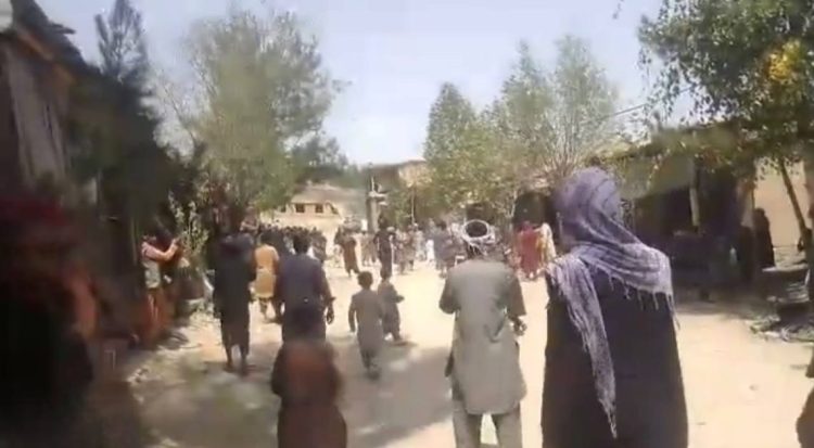 Local residents gather on a street in Badakhshan as tensions rise following clashes with Taliban forces in Yaftal-e Payin. (Photo credit: Exclusive)