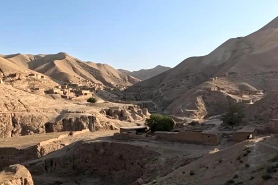 A mud-brick village sits in a dry, mountainous valley in Takhar province, where residents face a severe water shortage. (Photo credit: Our Village)