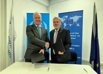 EU officials shake hands during a meeting on €15 million in assistance for food security and climate resilience in Afghanistan. (Photo credit: EU)