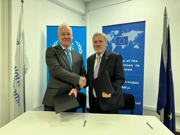 EU officials shake hands during a meeting on €15 million in assistance for food security and climate resilience in Afghanistan. (Photo credit: EU)