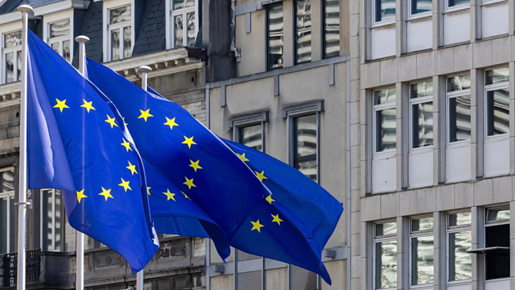 European Union flags wave outside a building as the EU expresses concern over the Kabul Dasht-e Barchi explosion. (Photo credit: AP Photo)