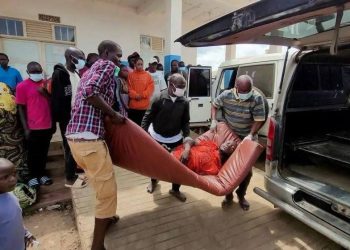 People carry an Ebola patient into an ambulance as health workers respond to the ongoing outbreak in the Democratic Republic of the Congo. (Photo credit: Reuters)