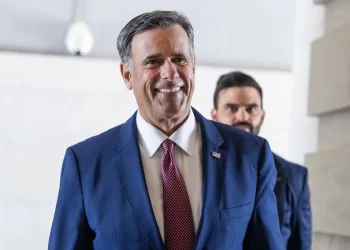 CIA Director John Ratcliffe walks with a smile during his visit to Moscow. (Photo credit: Tom Williams/CQ-Roll Call, Inc via Getty Images)