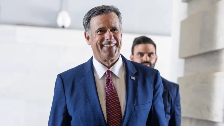 CIA Director John Ratcliffe walks with a smile during his visit to Moscow. (Photo credit: Tom Williams/CQ-Roll Call, Inc via Getty Images)