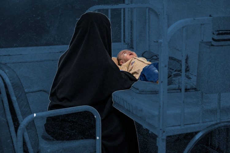 A mother sits beside her child on a hospital bed, reflecting the health challenges many families in Afghanistan face amid limited access to care. (Photo credit: AFP)