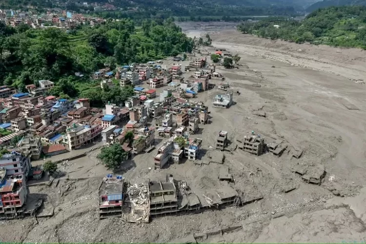 Floodwaters leave widespread destruction in Nepal, with villages, roads and infrastructure severely damaged. (Photo credit: AP)