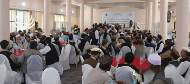 A crowd gathers in a hall during a Taliban workshop on standardizing Pashto and Dari spelling methods. (Photo credit: @bnadari1)