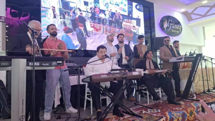 Artists perform music on stage during an Uzbek cultural evening for People of Afghanistan in Germany. (Photo credit: Exclusive)