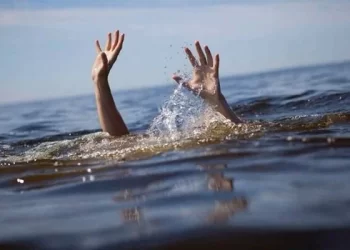 Hands emerge from the water in an image illustrating the dangers of swimming in the sea. (Photo: Mehrnews)
