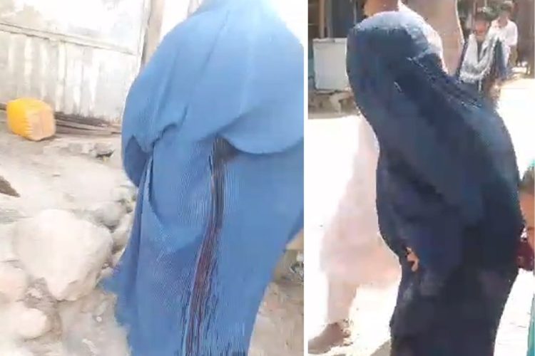 A woman in a blue burqa walks through the Yaftal-e Sufla market after being wounded during a Taliban crackdown on protesters. (Photo credit: Social Media)