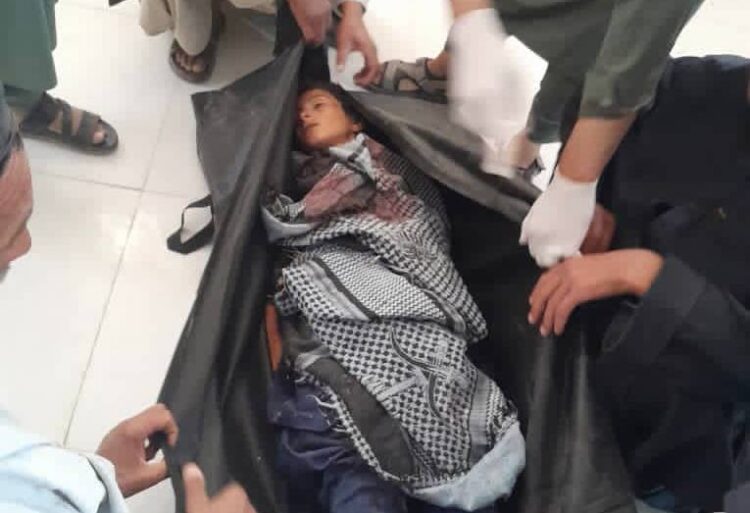 The body of a 12-year-old child killed by armed robbers in Badghis province. (Photo credit: Exclusive)