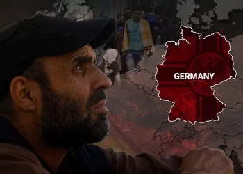 A man from Afghanistan looks on as migrants walk in the background, with a red-tinted map of Germany symbolizing the country's rising far-right sentiment. (Photo credit: Pexels + Picture-Alliance)